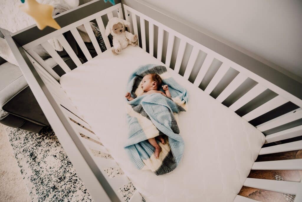You might not need to take any action if your baby's legs are getting stuck in the crib
