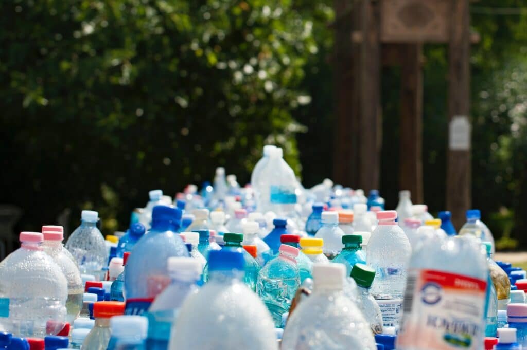 Piles of empty single-use water bottles