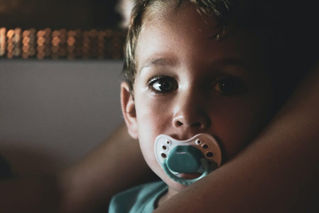Older child with a pacifier