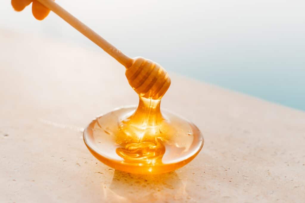 Honey on plate with spoon
