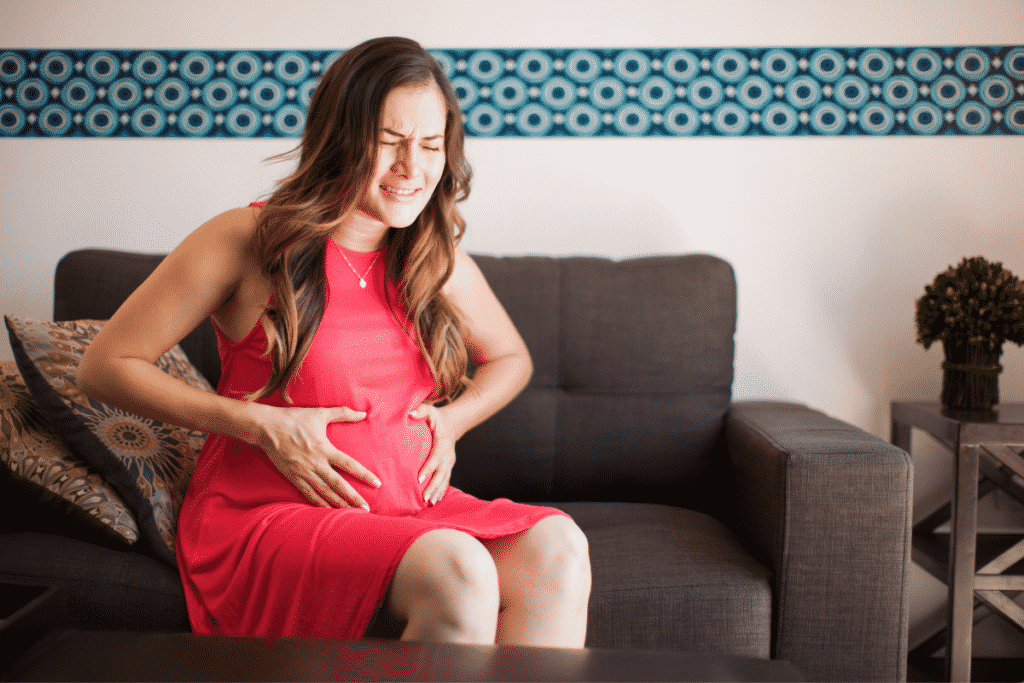 A pregnant woman having Braxton-Hicks contractions
