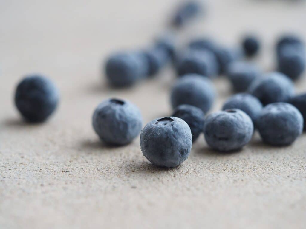 A handful of blueberries on an open countertop