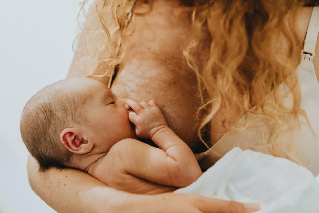 Newborn baby breastfeeding