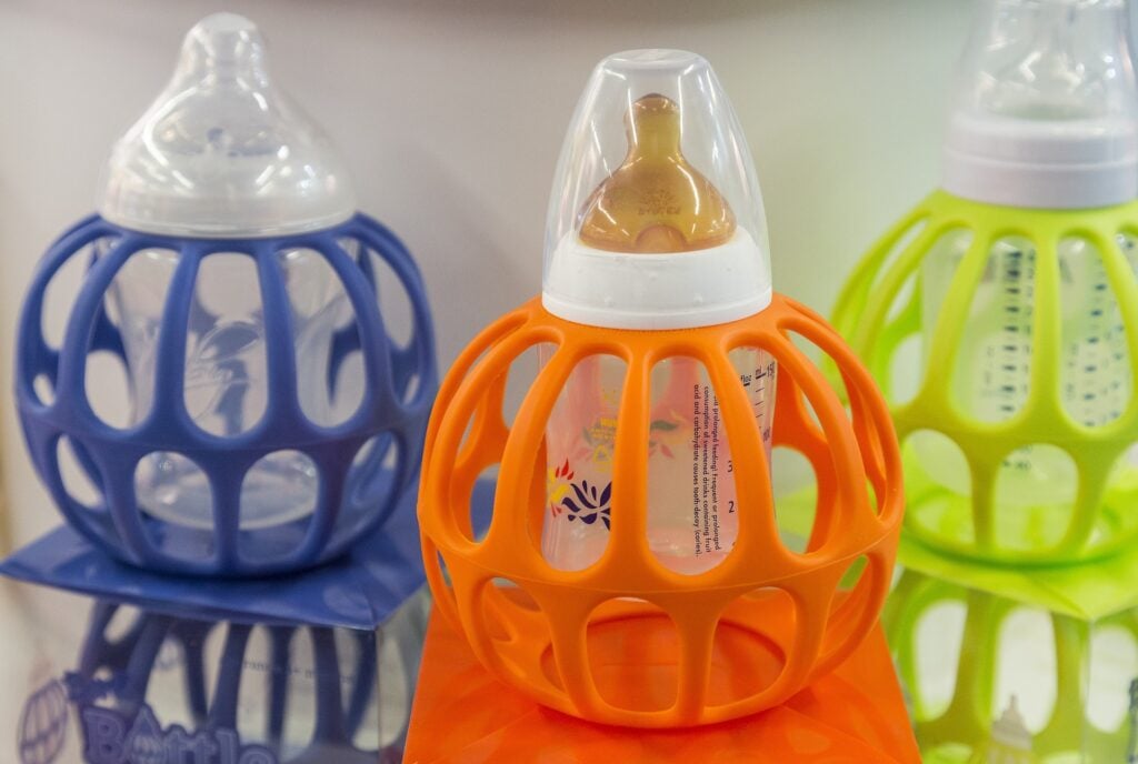 Different colored baby bottles