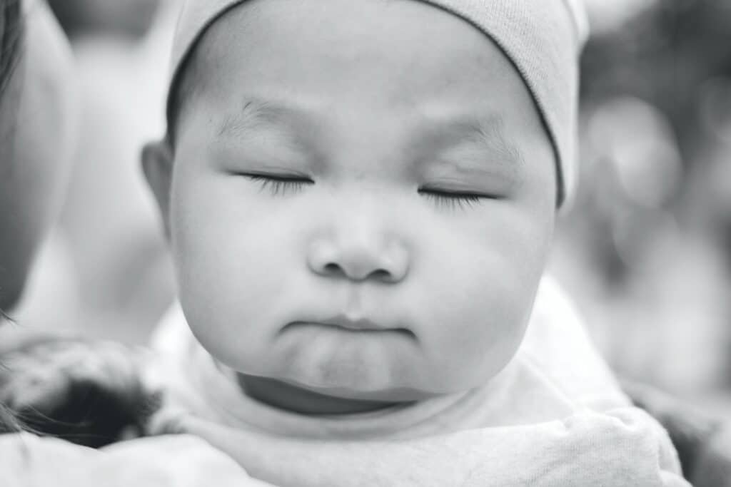 black and white photo of baby eyelashes