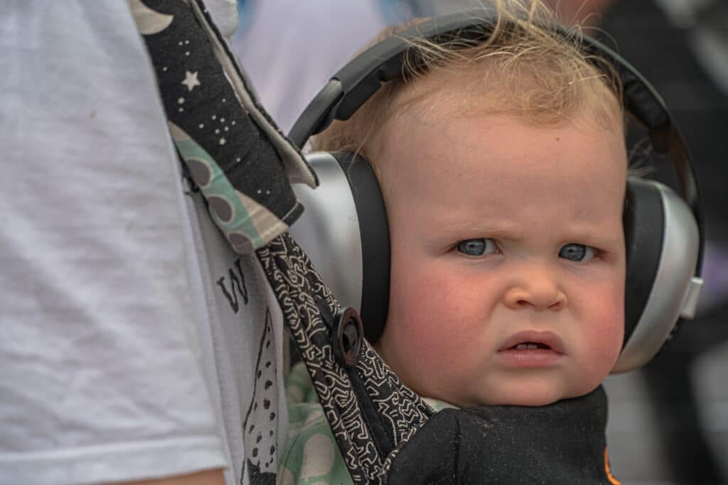 Don't forget a baby carrier and ear protection when you go to a game